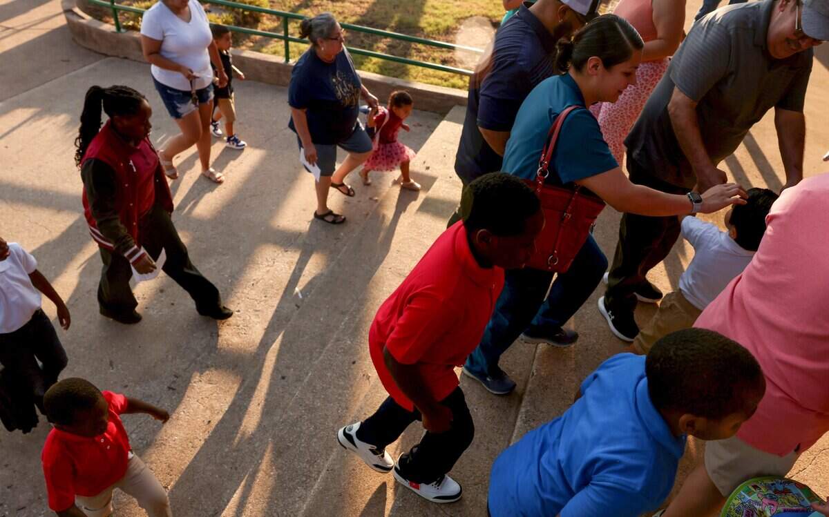 Students arrive at W.M. Green Elementary School for the first day of school on Monday, Aug. 10, 2026, in Fort Worth.